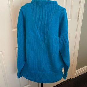 Turquoise colored sweater